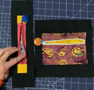 Examples of zippers used on a fidget quilt