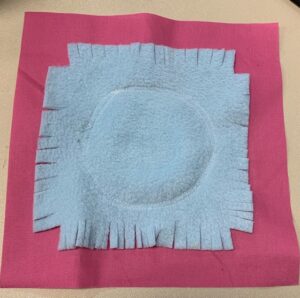 Lid sewn into a single fidget 