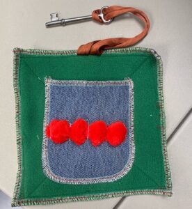 Pocket with a key on a string above